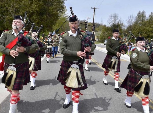 Clan Donald leading the parade through Baileys Harbor, WI